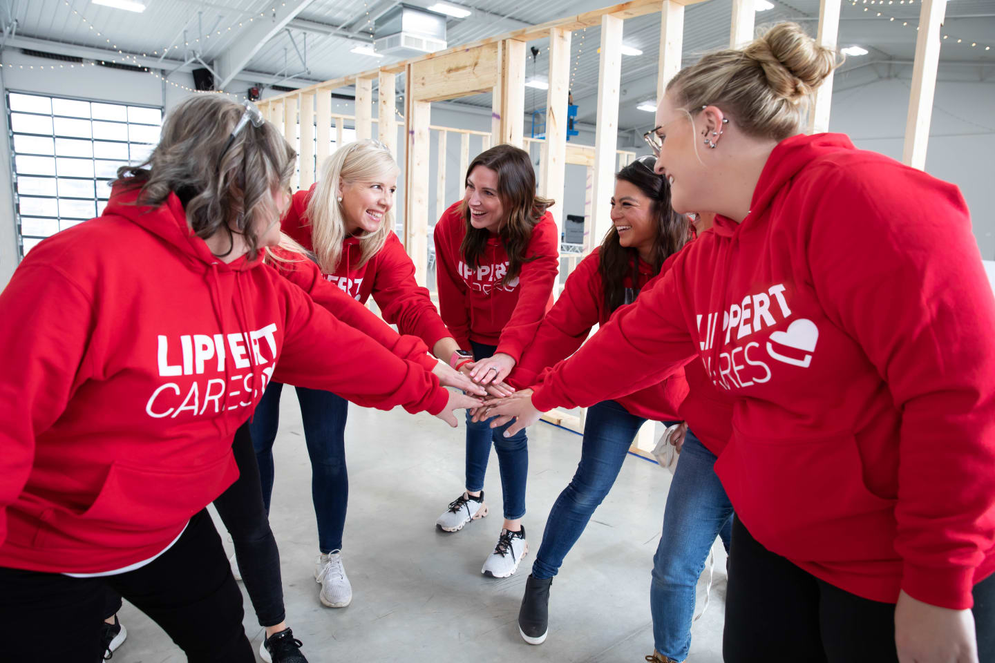 Lippert Cares Volunteers High-Five Team